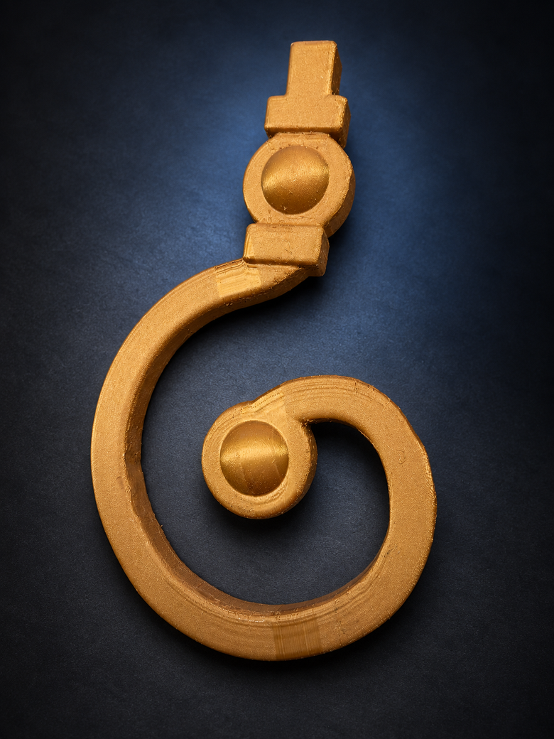 Goldfarbenes 3D-gedrucktes Spiralornament mit zwei erhabenen runden Details