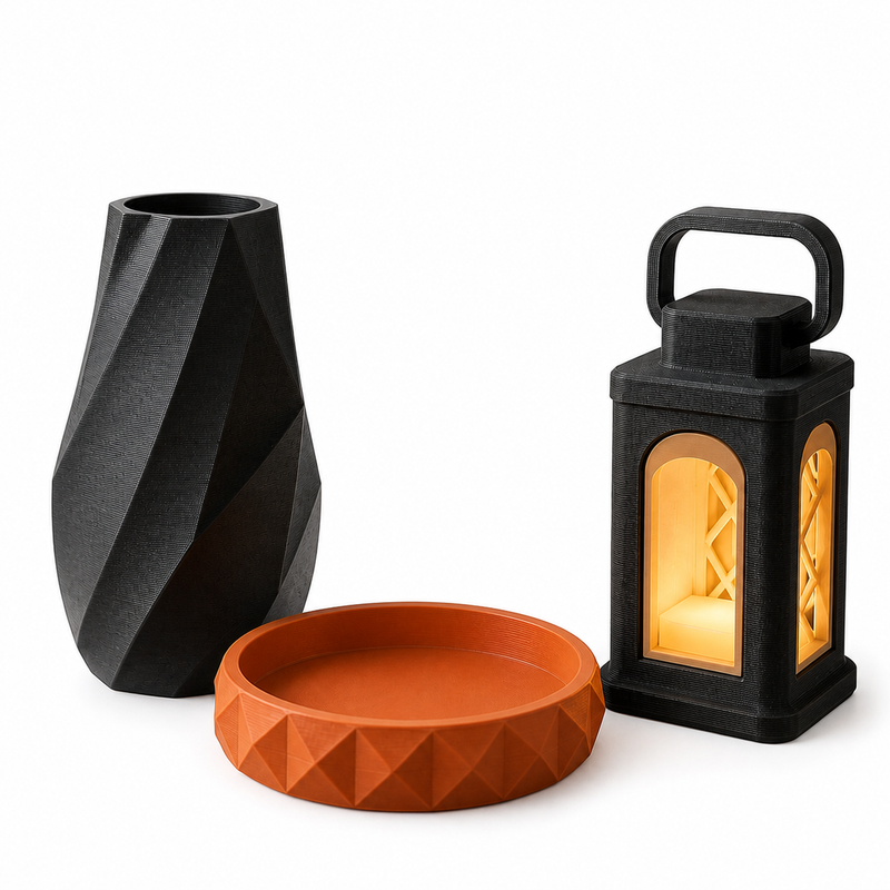 Decorative style set modern on white background: black facet vase, terracotta-colored facet tray and black LED lantern.