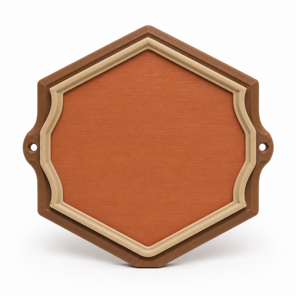 Product illustration of “Six-sided door sign in terracotta” on a white background: door sign; Basic shape: high-format hexagonal shield shape with two lateral eyes; Design: a multi-stage frame and a large smooth inner surface; Colours: terracotta, beige and brown.
