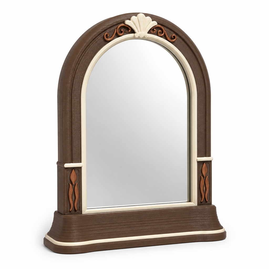 Product image of "Arc-shaped standing mirror with decorative giggle" on a white background: standing mirror; Basic shape: high arc shape on a wide stepped base; Design: narrow side supports and a plastisches upper palmetto ornament; Colours: dark brown, cream and copper.