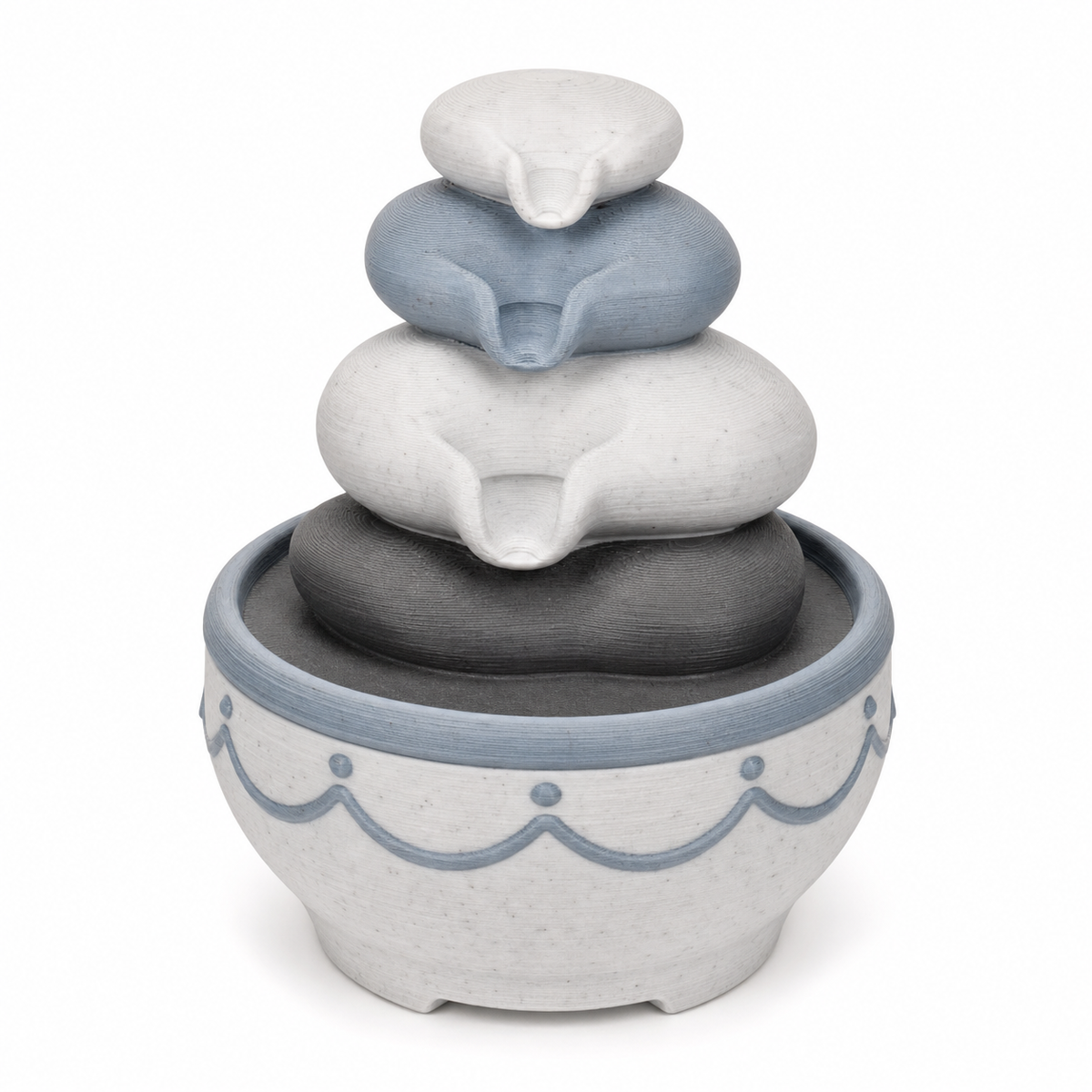 Product image of "Indoor fountains in stacked stone look" on white background: Indoor fountains; Basic shape: round collecting bowl with four stacked oval bowls in stone shape; Design: softly offset outlets and a natural balanced silhouette; Colours: white, grey and dark grey.