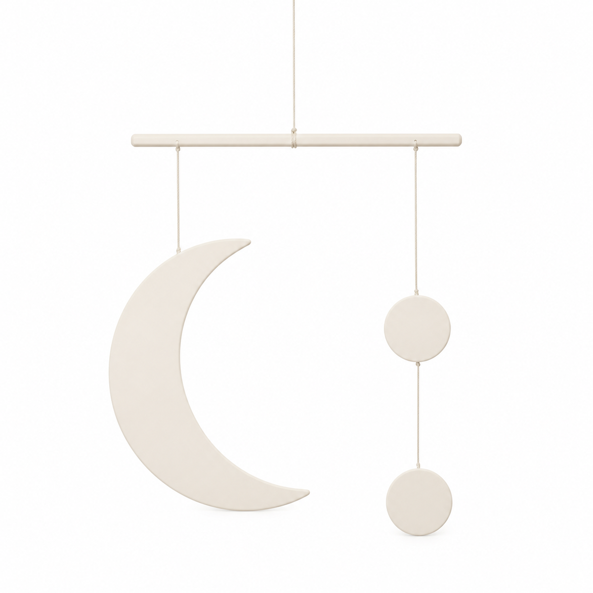 Warm white crescent mobile with two circular discs on white background