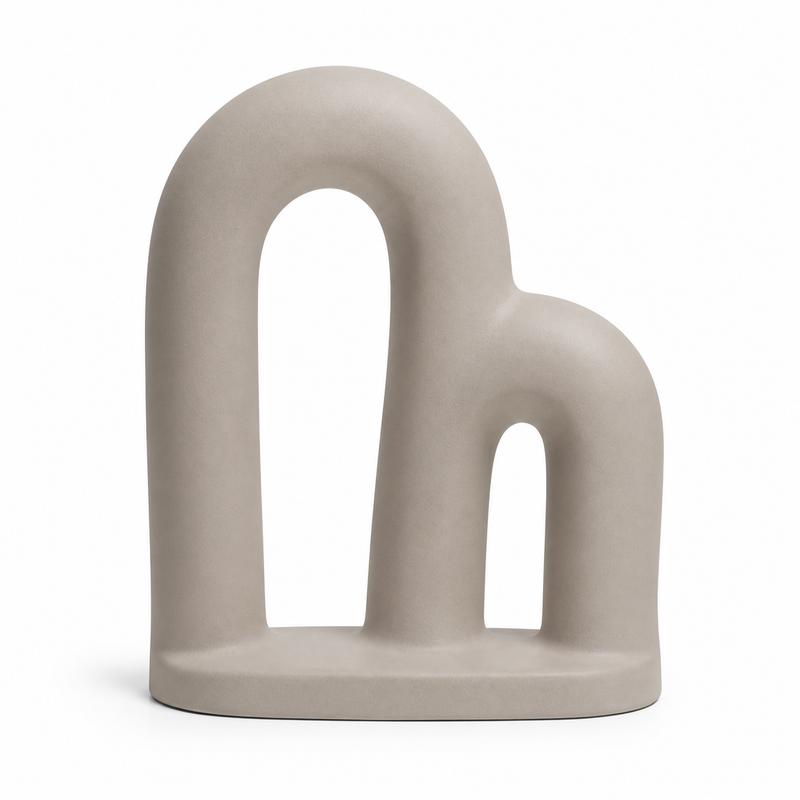 Taupe-colored minimalist double arc sculpture with two open circular arcs
