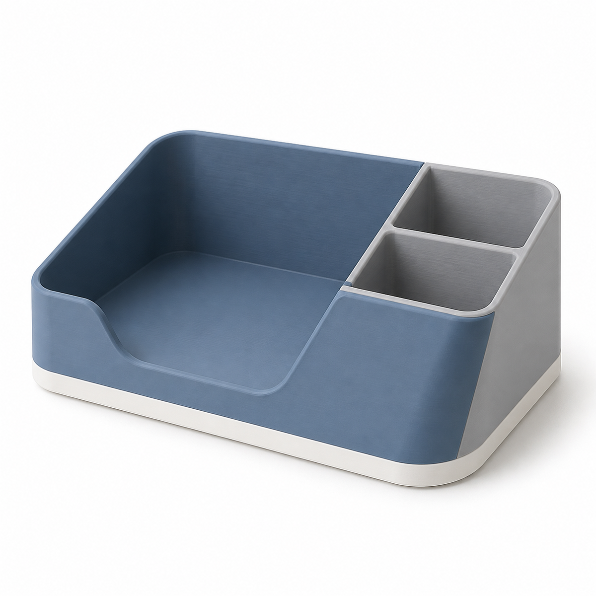Product image of "Three compartments in blue" on a white background: bathroom organiser; Basic shape: wide open compartment with large main compartment and two side compartments; Design: asymmetrically inclined interior walls and a bright lower edge; Colours: blue, grey and white.