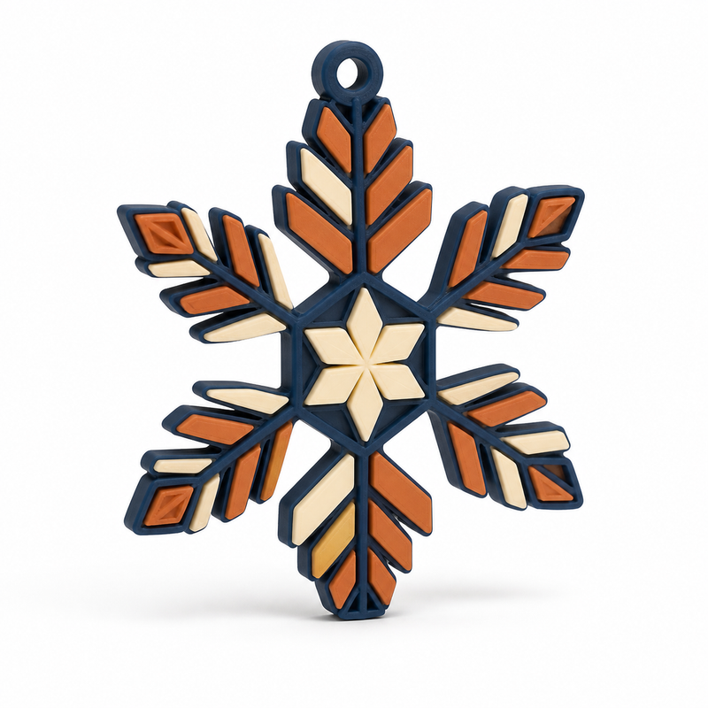 Product image of "Geometric snowflakes pendant in Navy and terracotta" on white background: window ornament; Basic shape: six-armed snowflakes shape with small upper eye; Design: edged arms and a creamy star-shaped center; Colours: navy blue, terracotta and cream.