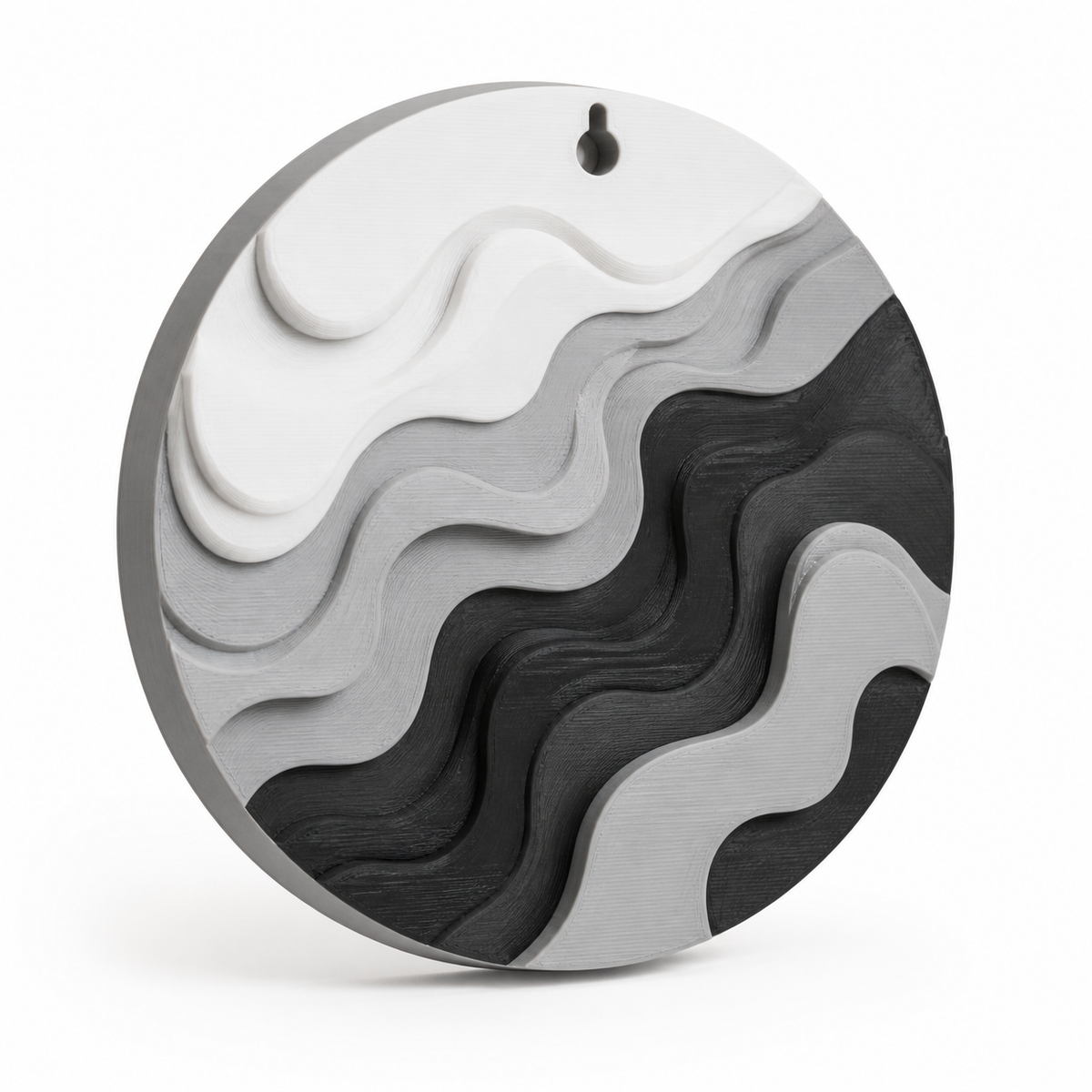 Product image of "round wall relief mit abstrakten Wellen" on a white background: wall relief; Basic shape: round reliefplatte with small upper suspension opening; Design: several organically layered wavebands at different heights; Colours: white, grey and black.