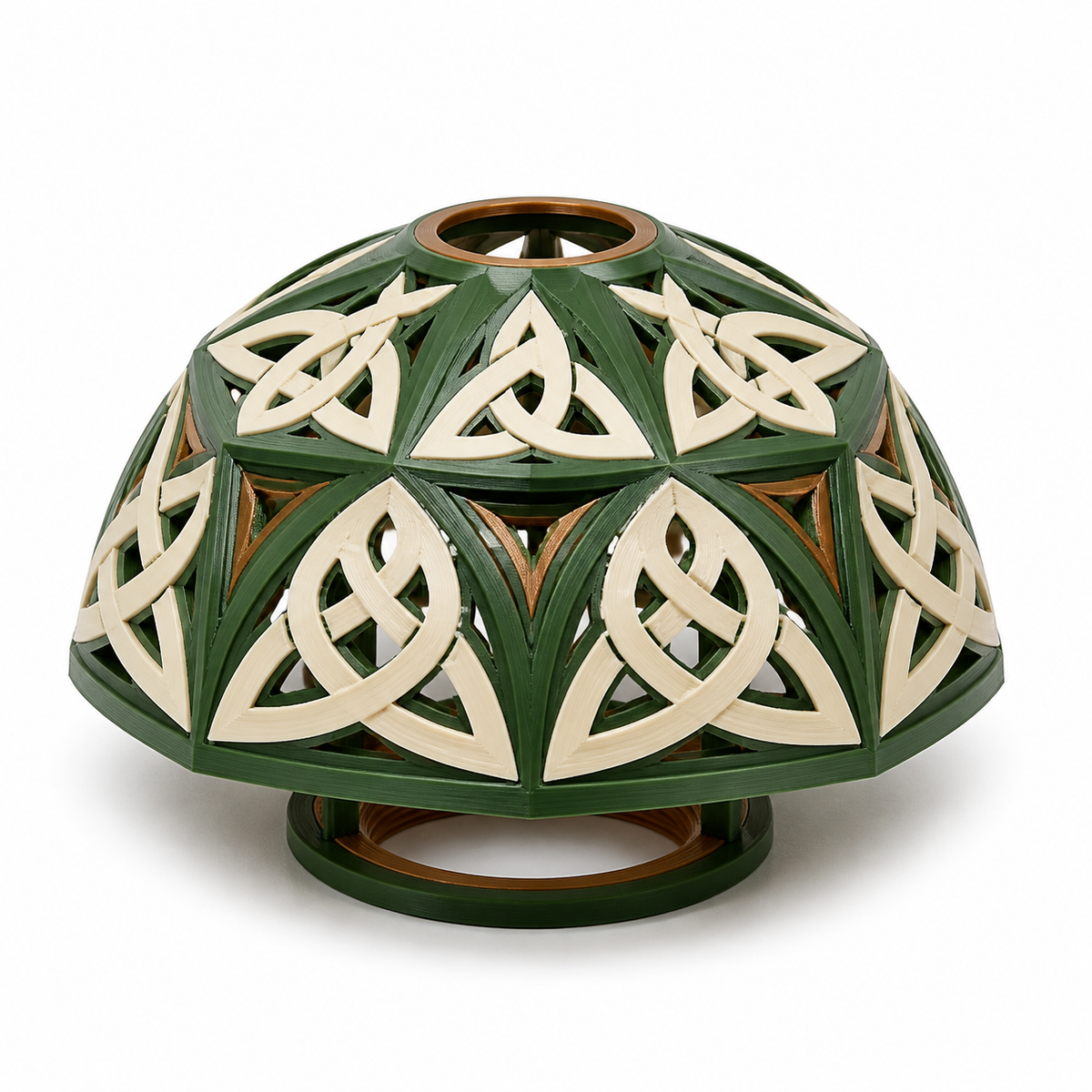 Product image of "Cupular lampshade with Triquetra fields" on white background: lampshade; Basic shape: wide low dome shape with round upper and lower opening; Design: circumferential perforated triple knot and a fine frame braid; Colours: dark green, cream and copper brown.