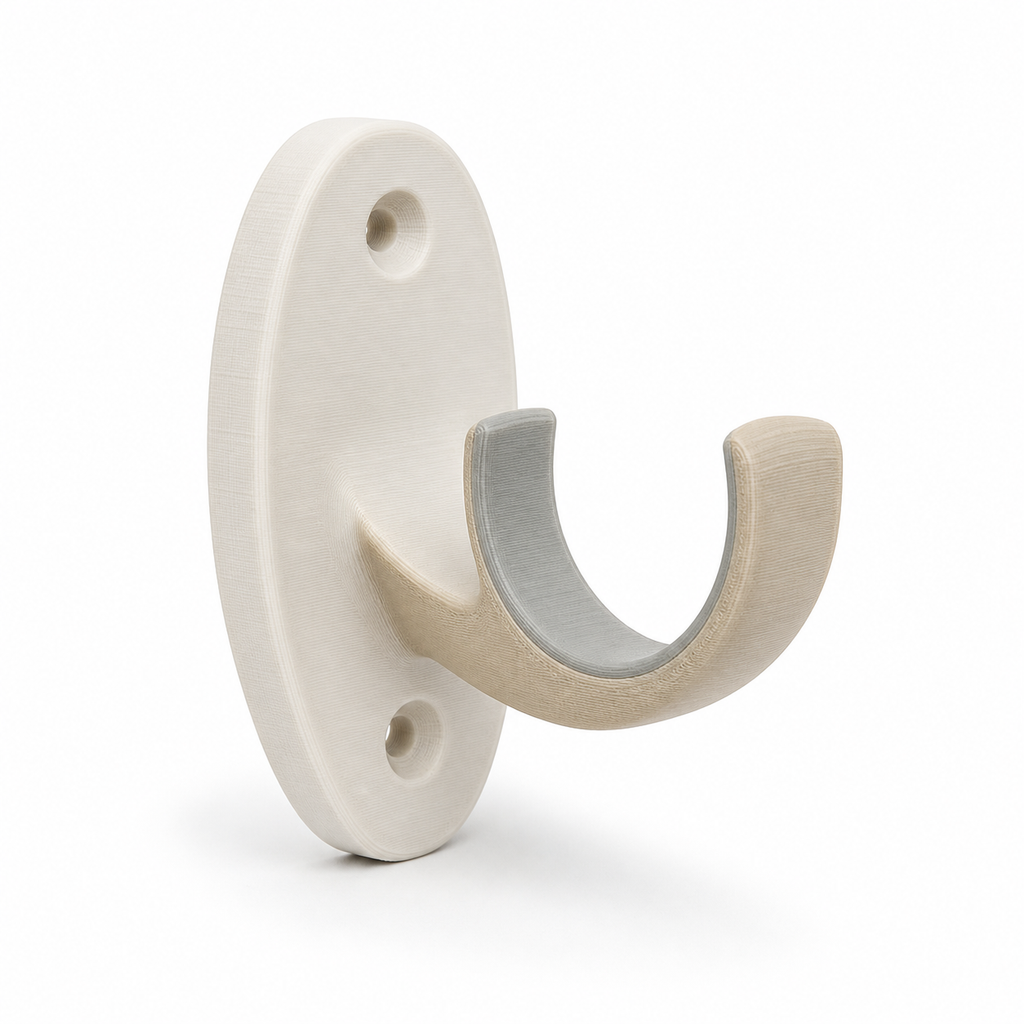 Product illustration of "soft curved curtain hook in natural tones" on white background: curtain hook; Basic shape: oval wallplatte with wide open single hook; Design: soft rounded edges and two unobtrusive fastening openings; Colours: off-white, beige and light grey.