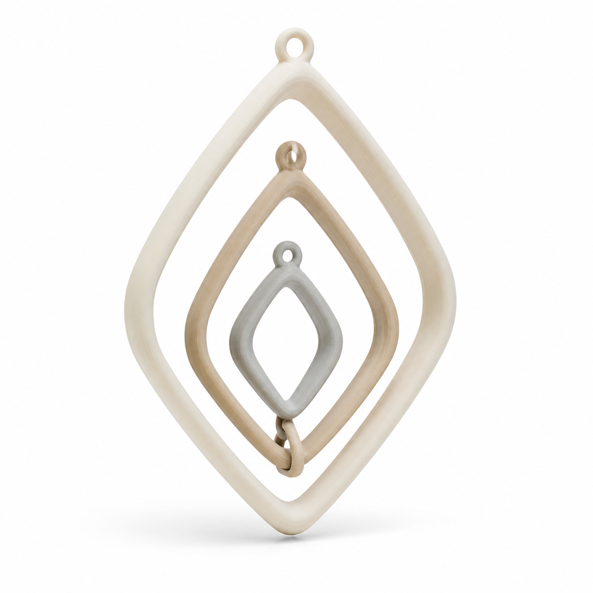Product illustration of "Route-shaped hanging decoration with quiet frame" on white background: hanging decoration; Basic shape: large open diamond shape with small upper suspension loop; Design: four nested softly rounded frames and a small inner rod; Colours: off-white, beige and light grey.