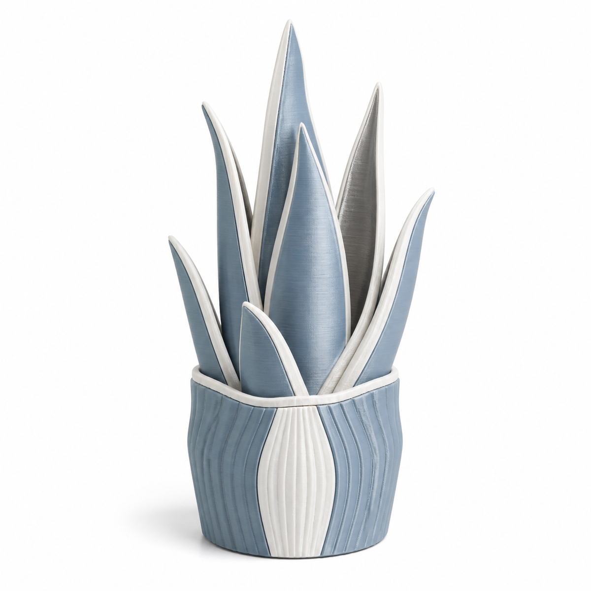 Product illustration of "Artificial leaf plant in sky blue and white" on white background: artificial plant; Basic shape: upright group of long pointed leaves in a ribbed cover; Design: several high-rise leaves and a vertical bright pot zone; Colours: sky blue, white and silver grey.