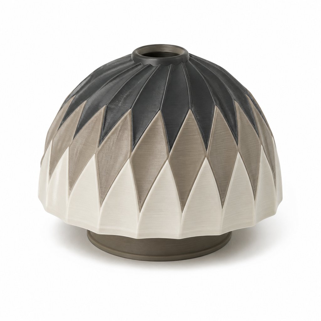 Product illustration of "dome-shaped lampshade with leaves facets" on white background: lampshade; Basic shape: wide low dome shape with small round upper opening; Design: several overlaid pointed leaves in a uniform wreath; Colours: anthracite, taupe and cream.
