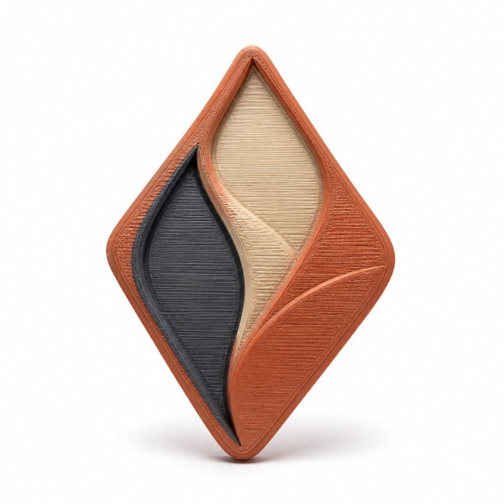 Rautenförmiger Magnet mit Blattflächen – Produktansicht auf weißem Hintergrund; Farben: Terrakotta, Creme und Anthrazit.