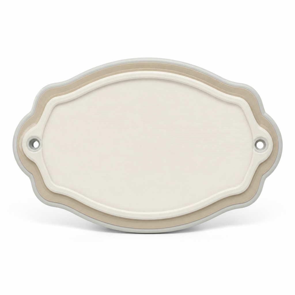 Product illustration of "Oval wall sign in soft natural tones" on white background: wall sign; Basic shape: wide curved oval shape with two small side fastening eyes; Design: a double corrugated bright frame and a large free middle; Colours: off-white, beige and light grey.