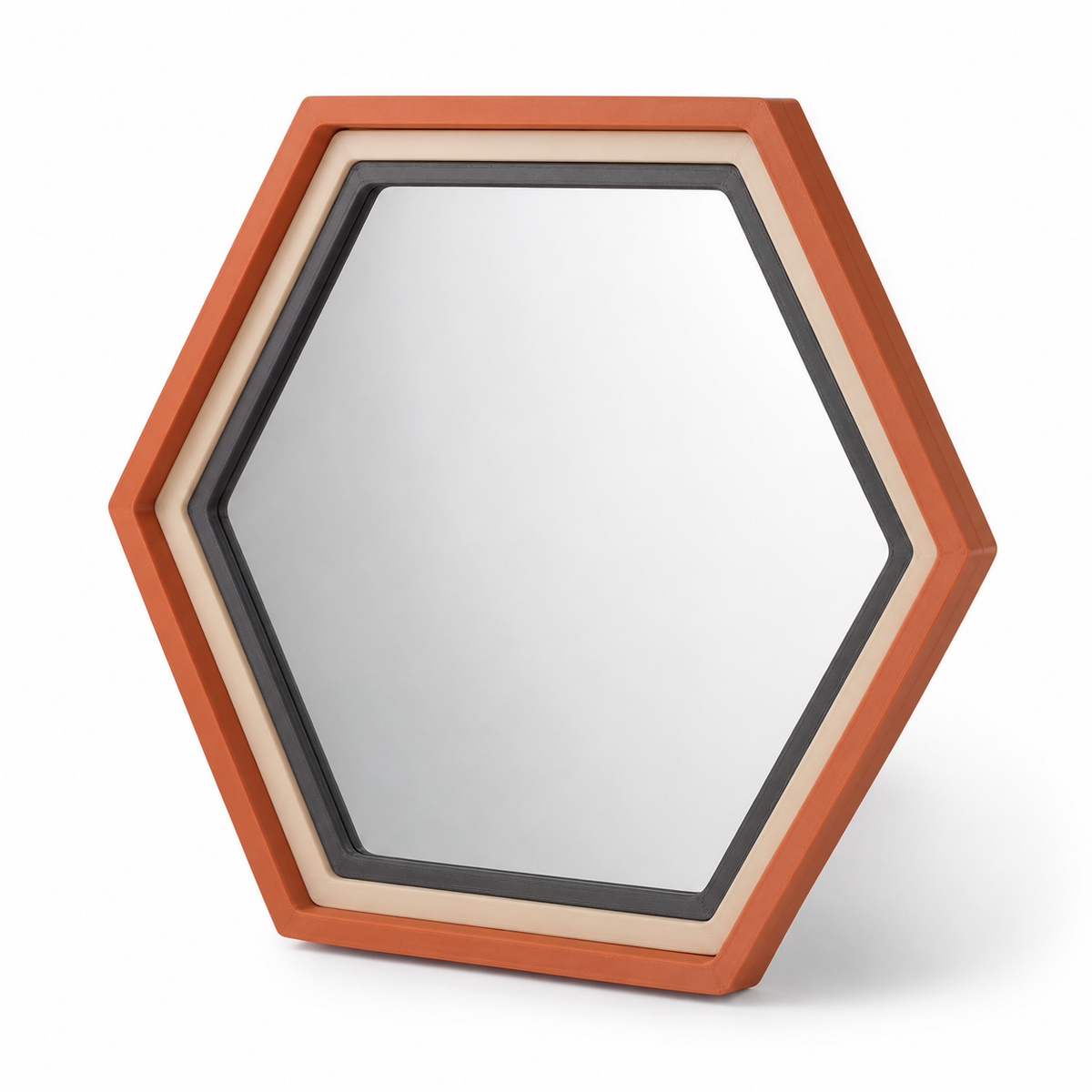 Product illustration of “Six-sided mirror frames in terracotta” on a white background: Mirror frames; Basic shape: regular hexagonal shape with triple-sided edge; Design: wide clear framebands and a slightly rearward inclined Placement; Colours: terracotta, cream and anthracite.