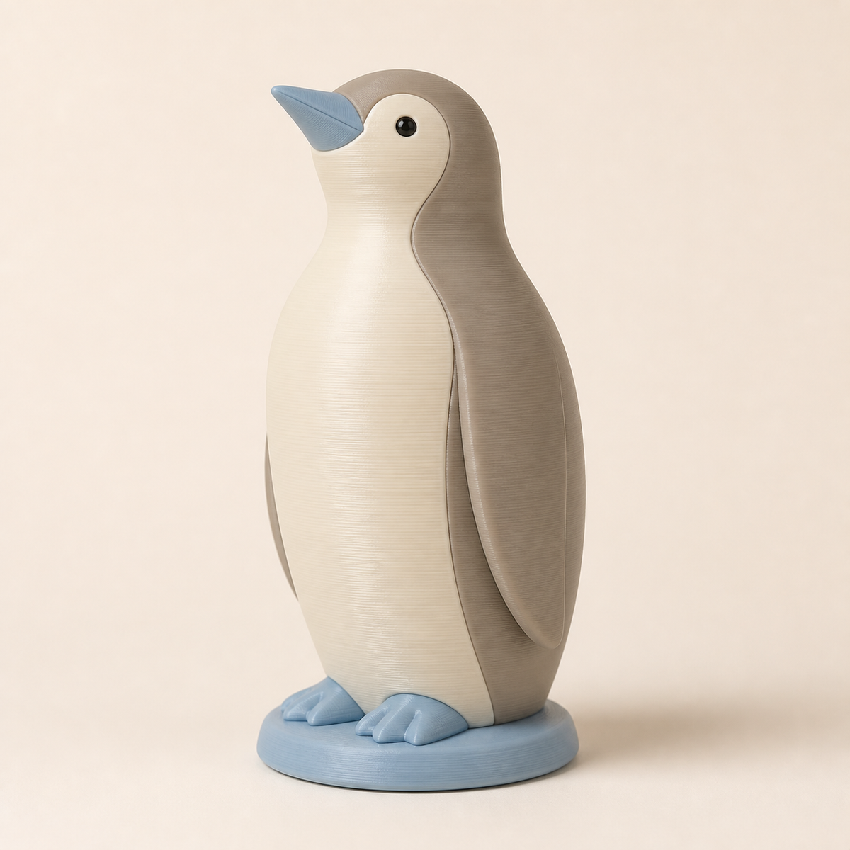 Winterfigur Pinguin Eisgruß im Stil Still aus 3D-gedrucktem PETG in Taupe, Hellblau, Creme