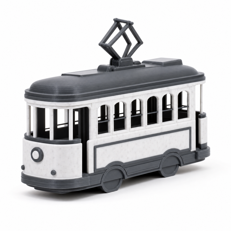 Dekomodell Marmoroptik-tram – Produktansicht auf weißem Hintergrund; Farben: Marmorweiß, Dunkelgrau und Schwarz.
