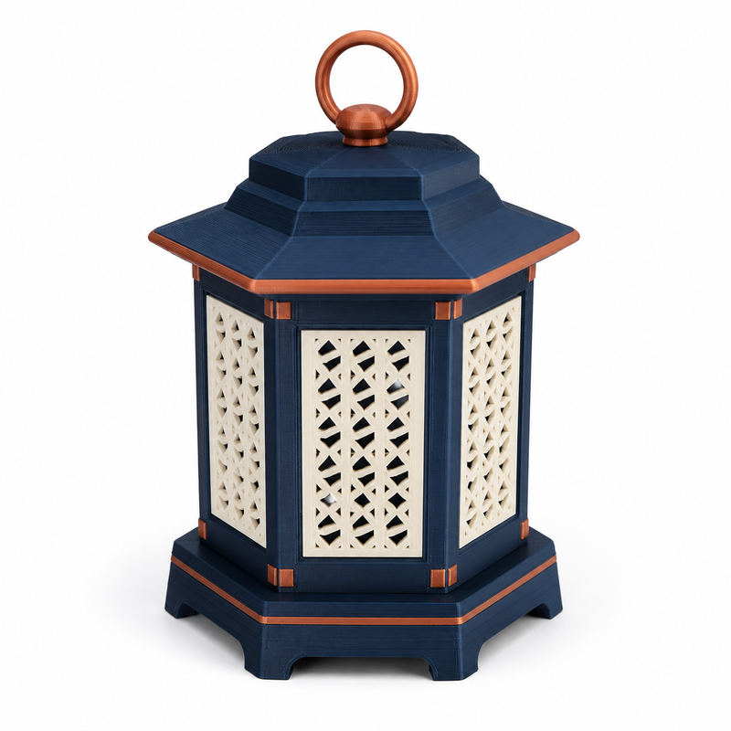 Product illustration of "Dekolatene Nachtkupferr" on white background: garden lantern; Basic shape: hexagonal lantern body with stepped roof and ring handle; Design: bright side panels with decoratively broken middle motifs; Colours: dark blue, copper and off-white.