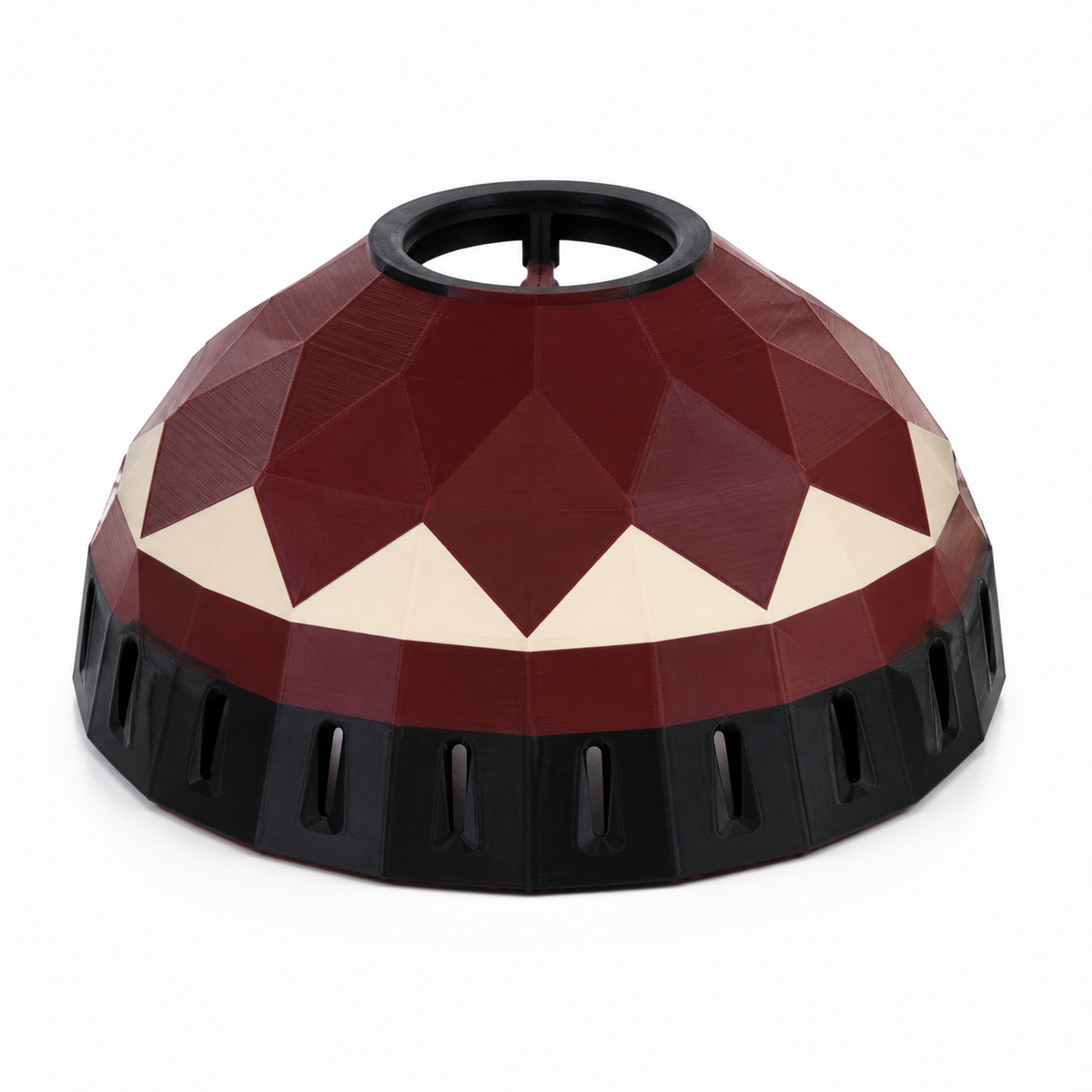 Dome-shaped lampshade with bordeaux red facets, cream-colored trim and black border on white background.