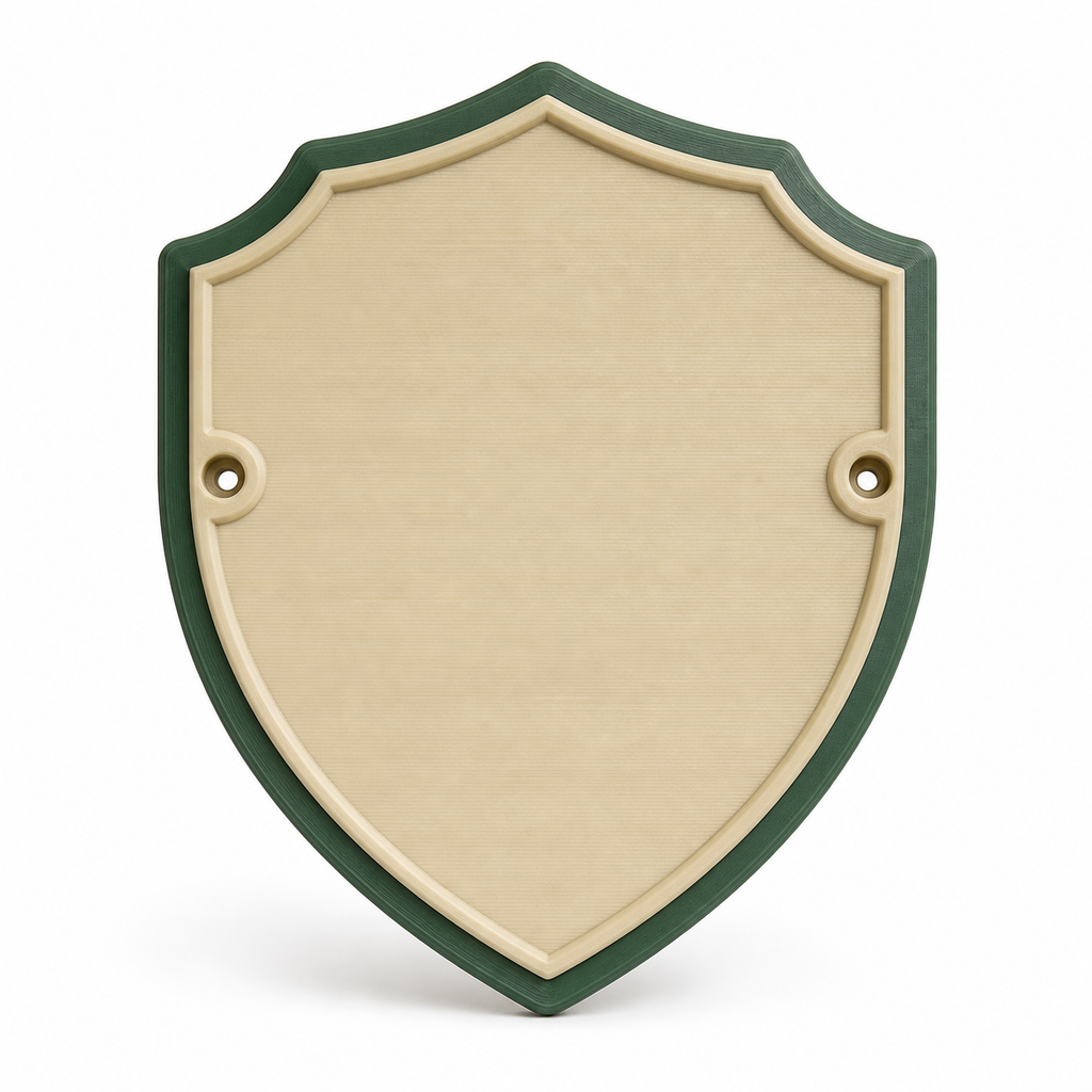 Product illustration of “wall sign emerald coat of arms” on white background: wall and door sign; Basic shape: classic shield silhouette with curved head and pointed foot; Design: large beige-coloured middle in a sleek dark green version; Colours: dark green, beige and gold.