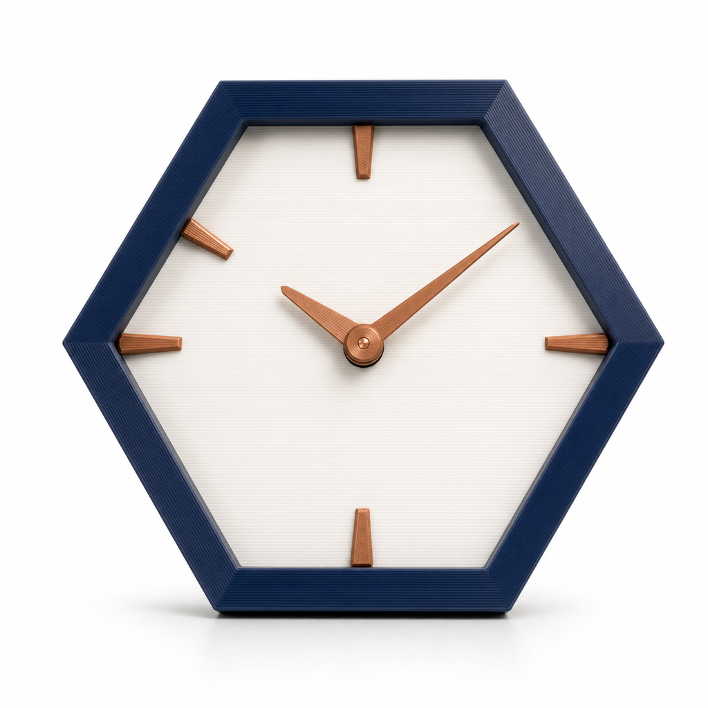 Product image of “table clock nightwabe” on white background: table clock; Basic shape: regular hexagonal case; Design: bright dial with few distinctive hour blocks; Colours: dark blue, copper and off-white.